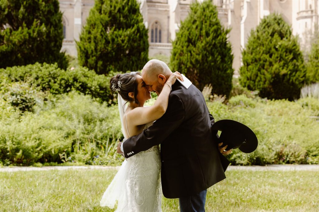candid elopement ceremony in front of the national cathedral in dc