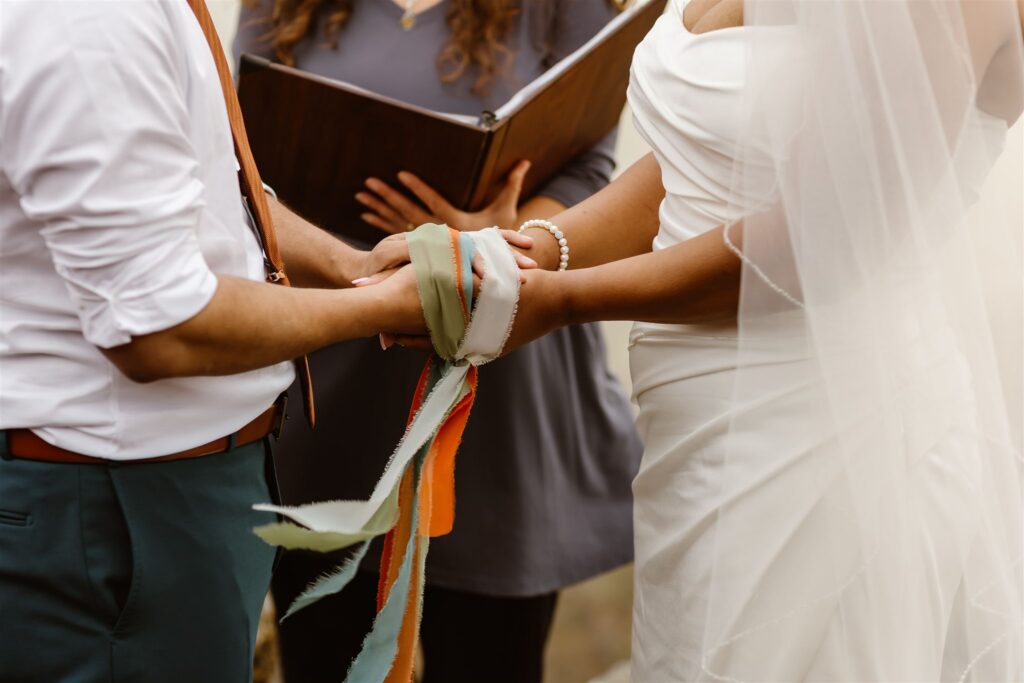 hand fasting ceremony during a two day elopement in shenandoah national park