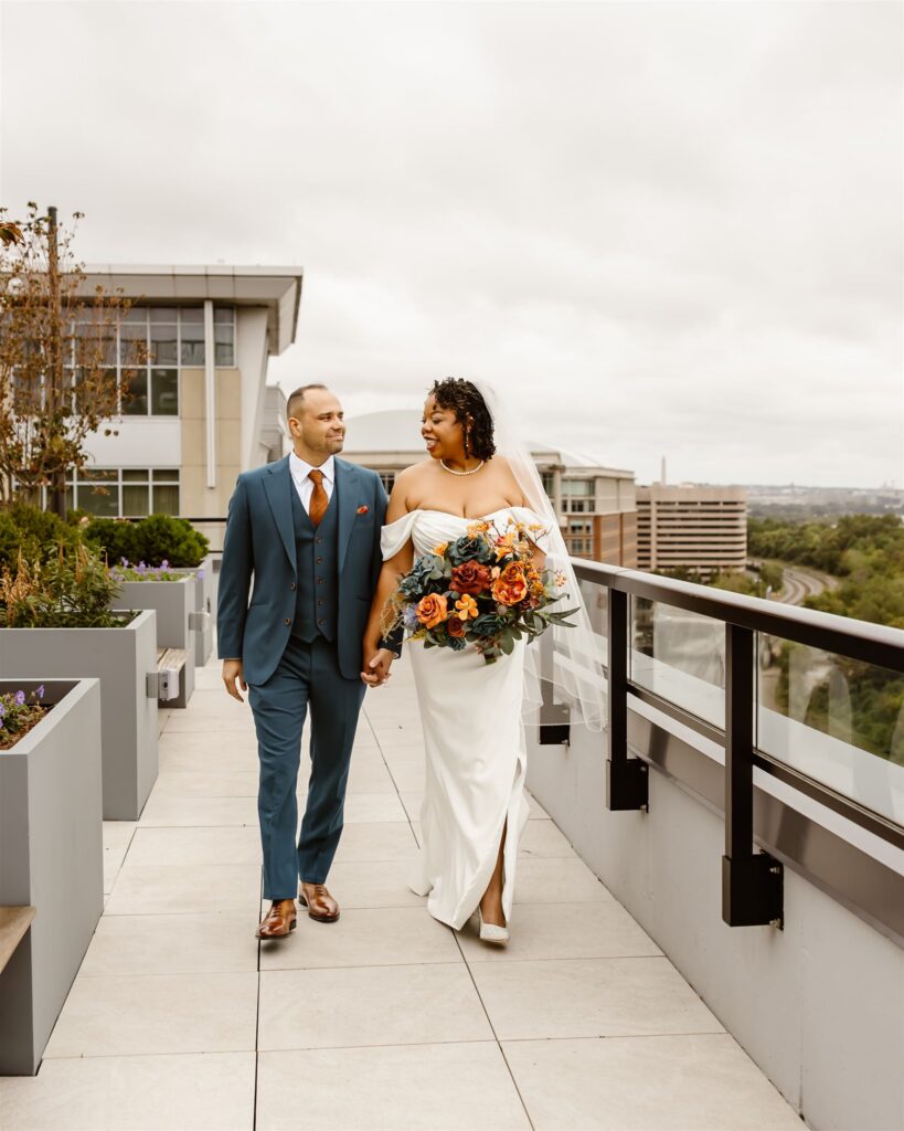 bride and groom first look on the rooftop of their apartment building 