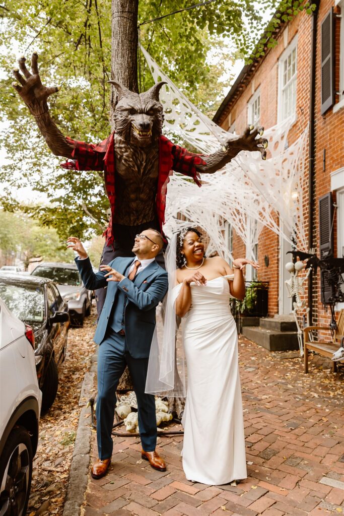 bride and groom having fun and exploring the cobblestone streets of Old Town Alexandria