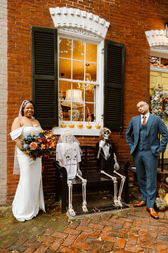 bride and groom having fun and exploring the cobblestone streets of Old Town Alexandria