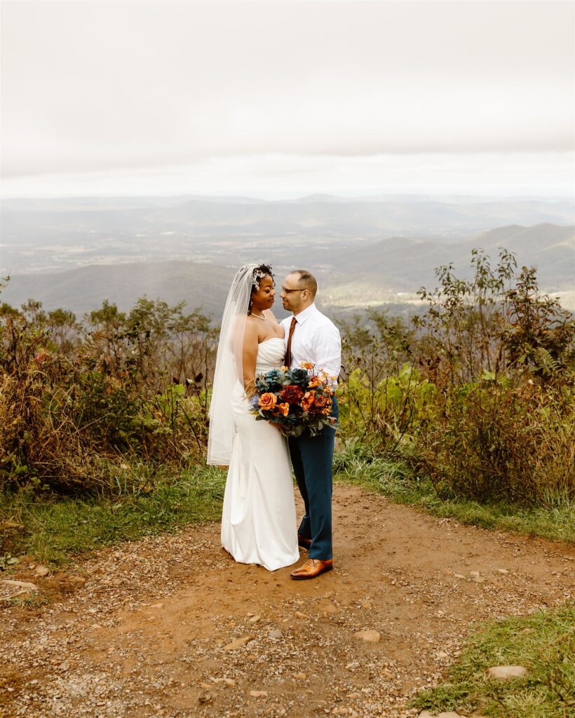 elopement couple enjoying the mountains in shenandoah national park during their two day elopement adventure