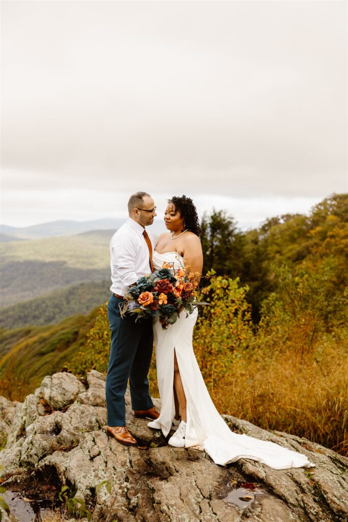 elopement couple enjoying the mountains in shenandoah national park during their two day elopement adventure