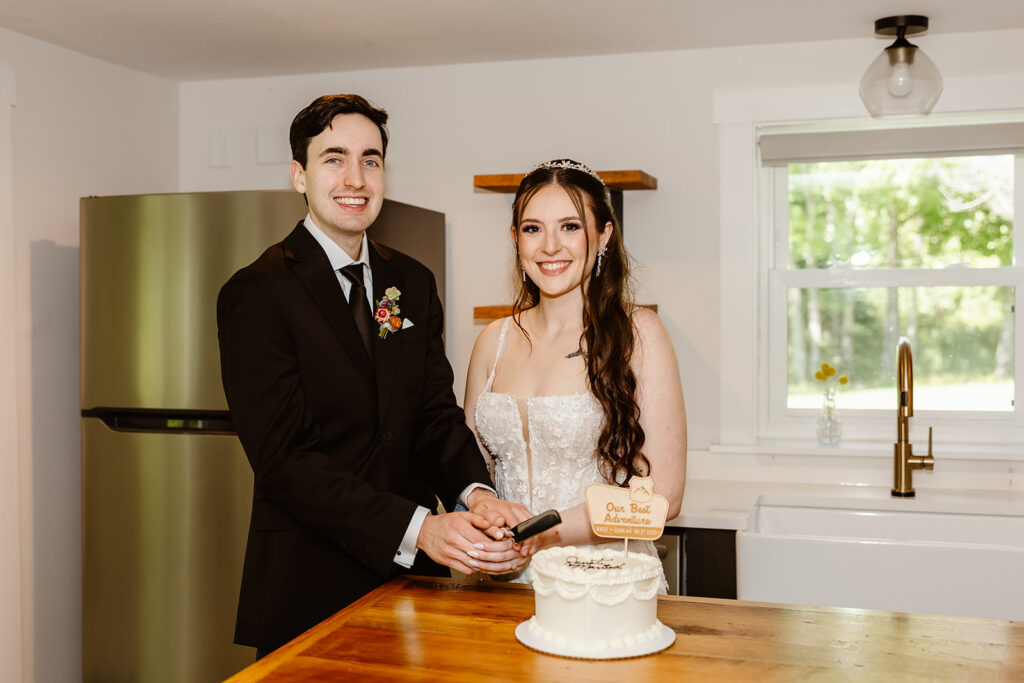 sweet bride and groom cutting cake