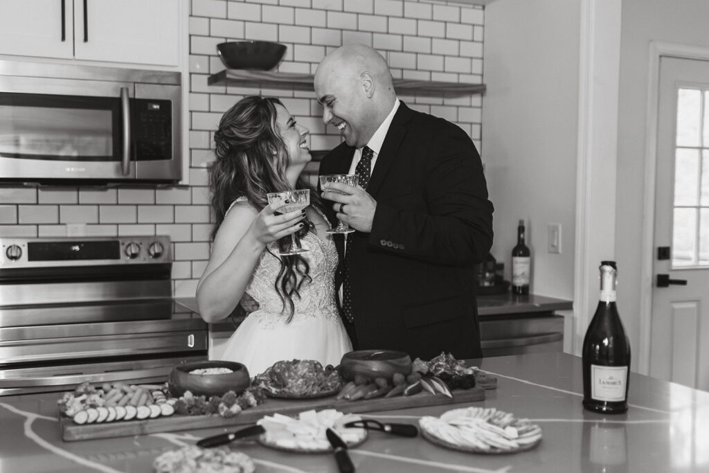 playful elopement couple enjoying some food at their airbnb