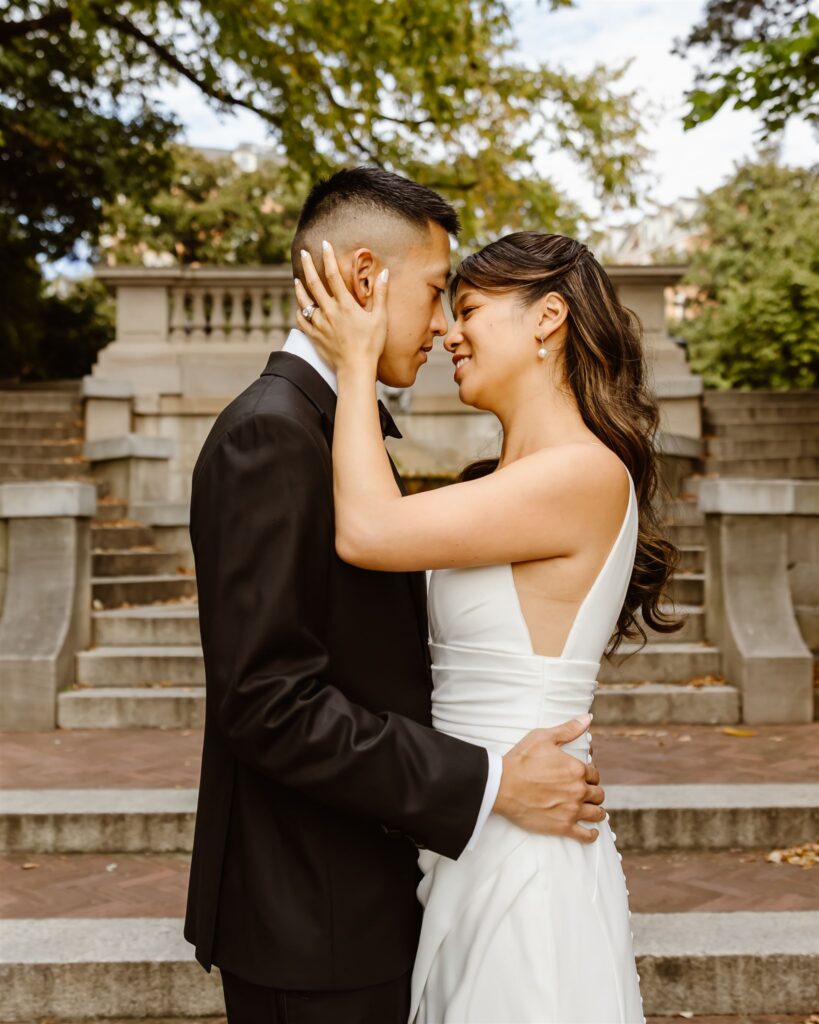 bride and groom posing on the spanish steps in washington dc