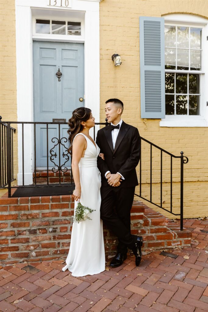 bride and groom wandering the colorful streets of georgetown, dc