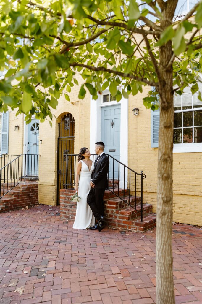 bride and groom wandering the colorful streets of georgetown, dc