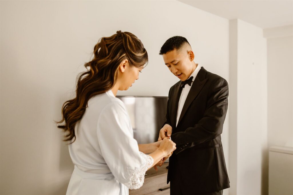 bride and groom getting ready moments