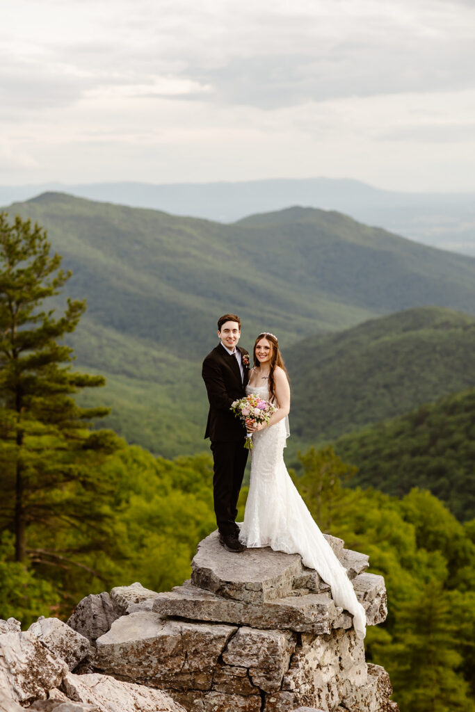 bride and groom at a mountain overlook during their shenandoah national park elopement