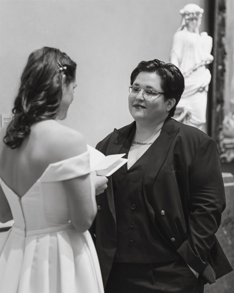 candid national gallery of art elopement ceremony in front of paintings