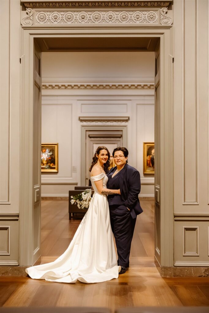 the wedding couple standing together at the National Gallery of Art
