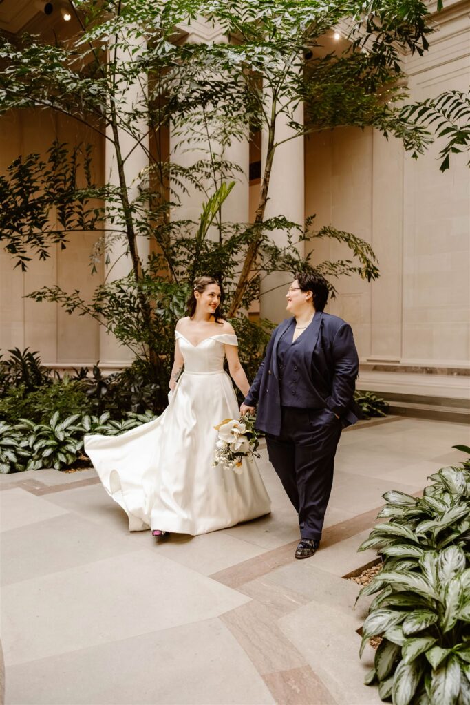 the elopement couple surrounded by greenery for elopement photos