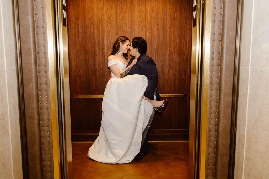 sweet elopement couple kissing in an elevator