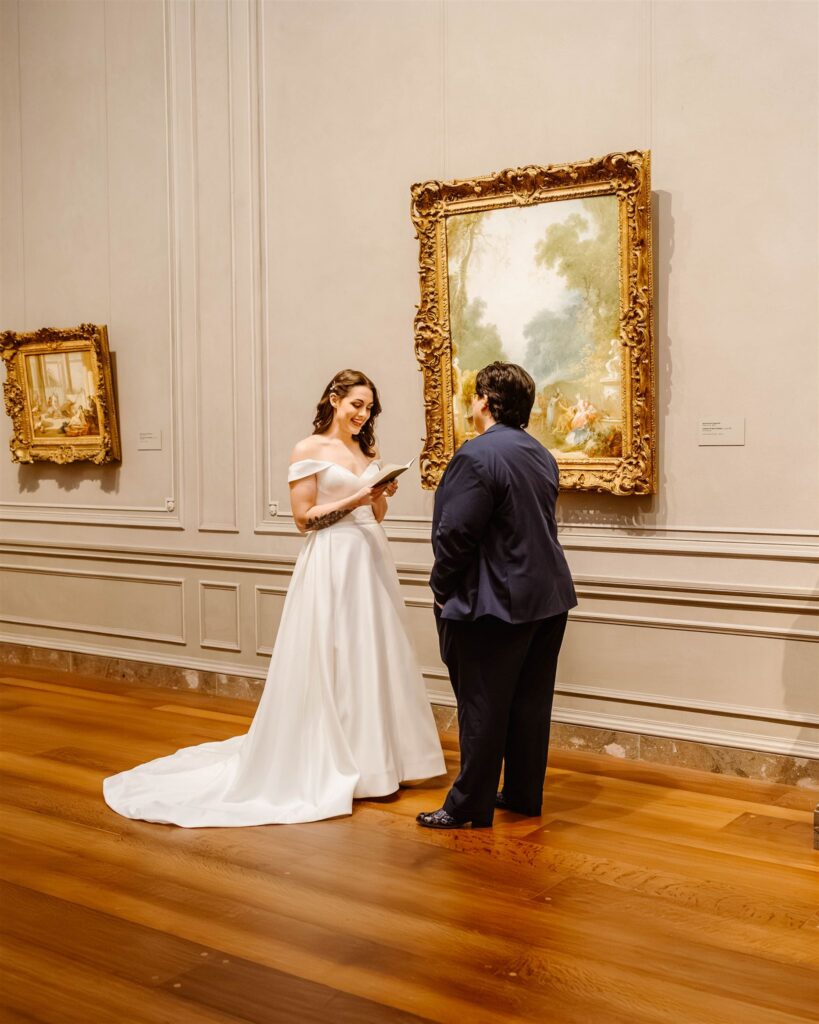 candid national gallery of art elopement ceremony in front of paintings