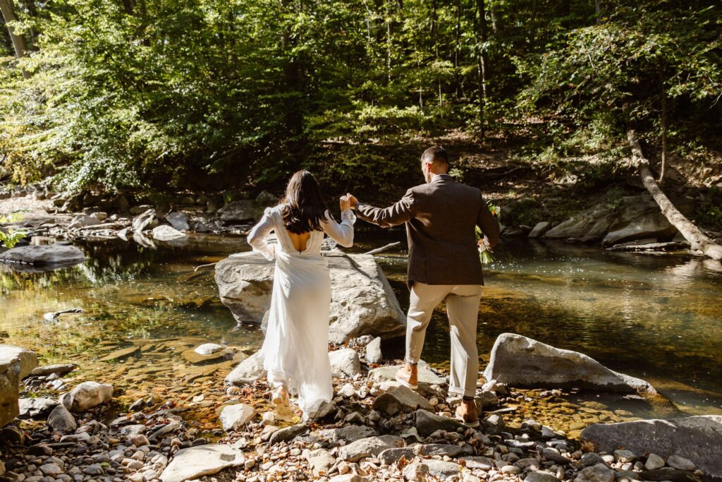 playful elopement couple at the rock creek park