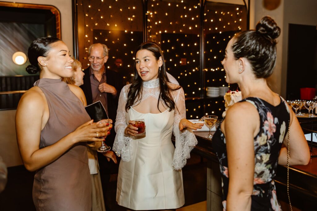 candid micro wedding reception moments at a pizza shop, a non traditional wedding venue in DC