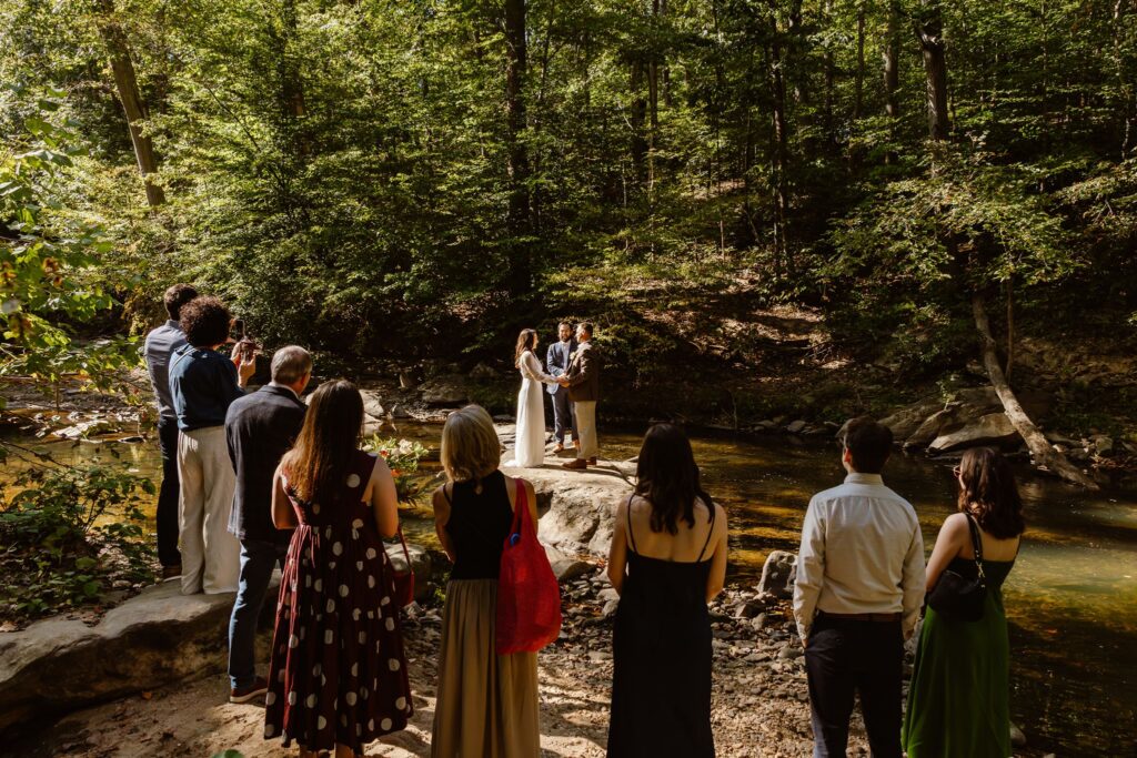 intimate elopement ceremony with guests at the rock creek park