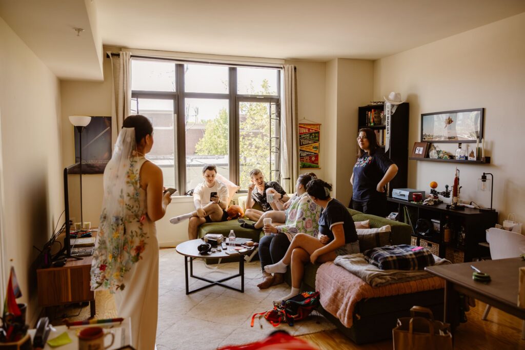 brides getting ready with their loved ones at their home in Alexandria