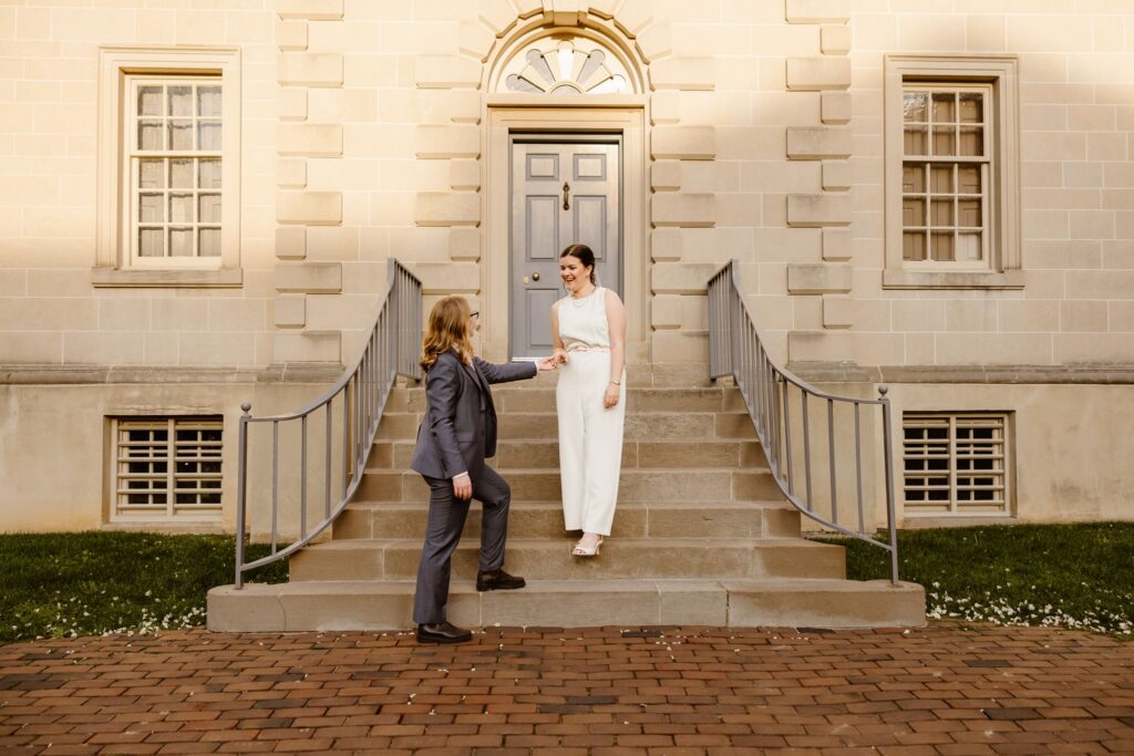 playful brides in during their micro wedding in old town alexandria