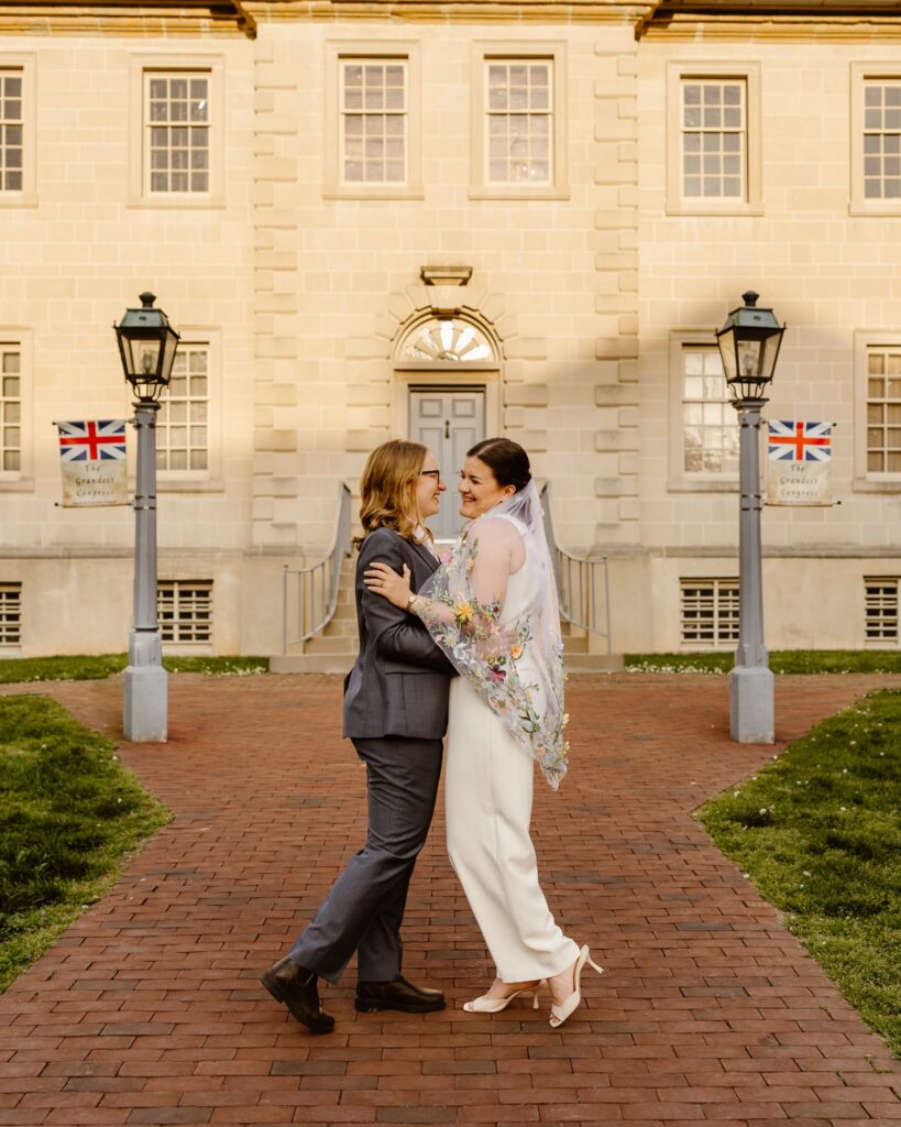 playful brides during their micro wedding in old town alexandria