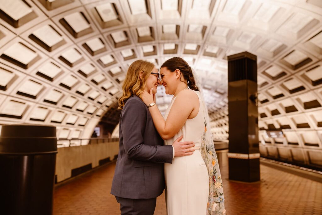 playful queer couple in the dc metro station during their elopement