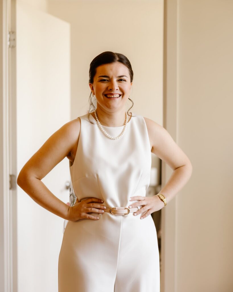 bride in an elegant white pantsuit