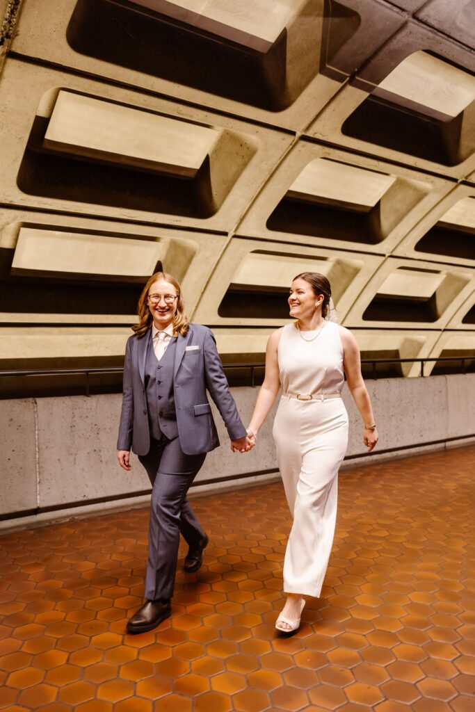 playful queer couple in the dc metro station during their elopement