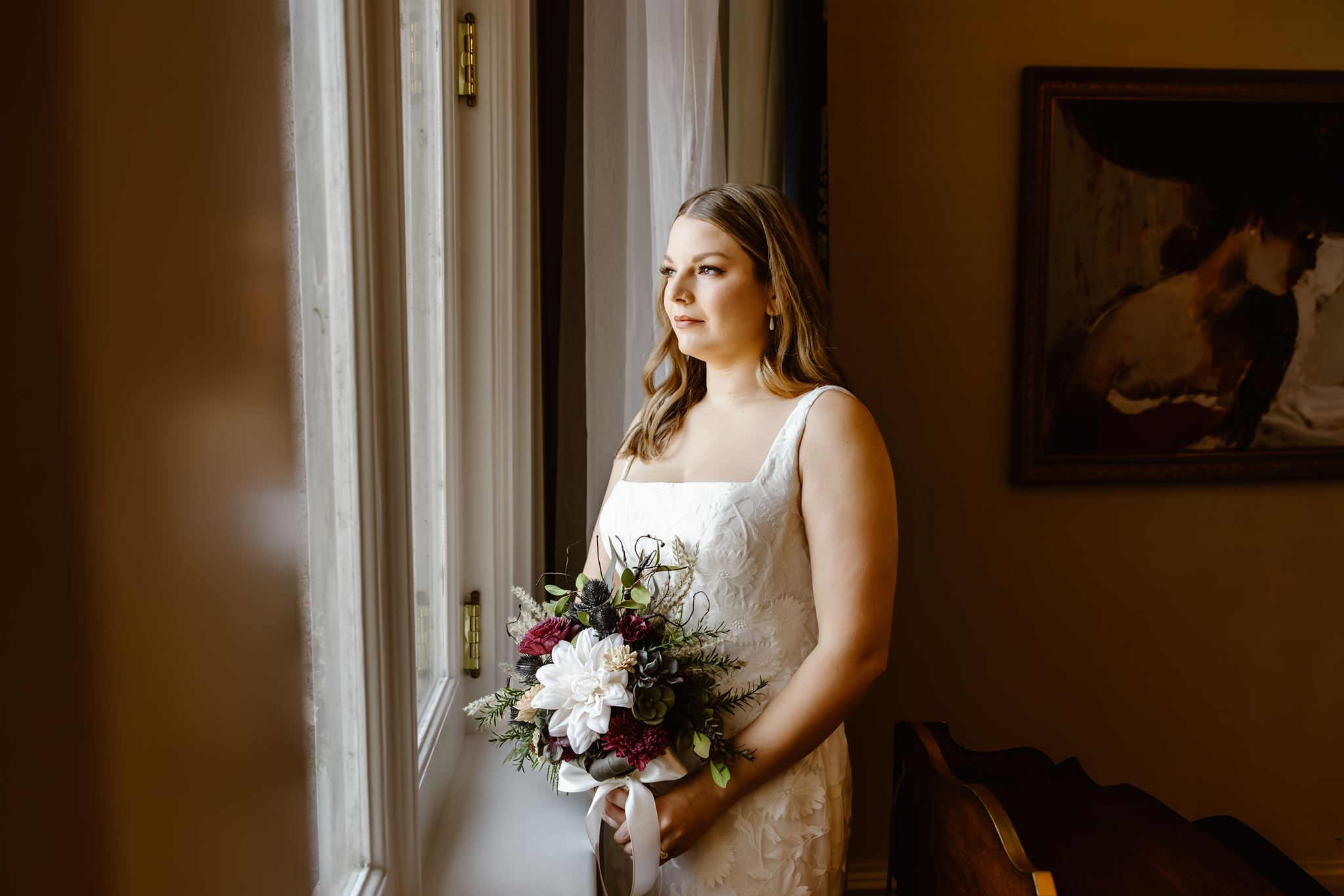 bride standing in front of the window in waldorf astoria