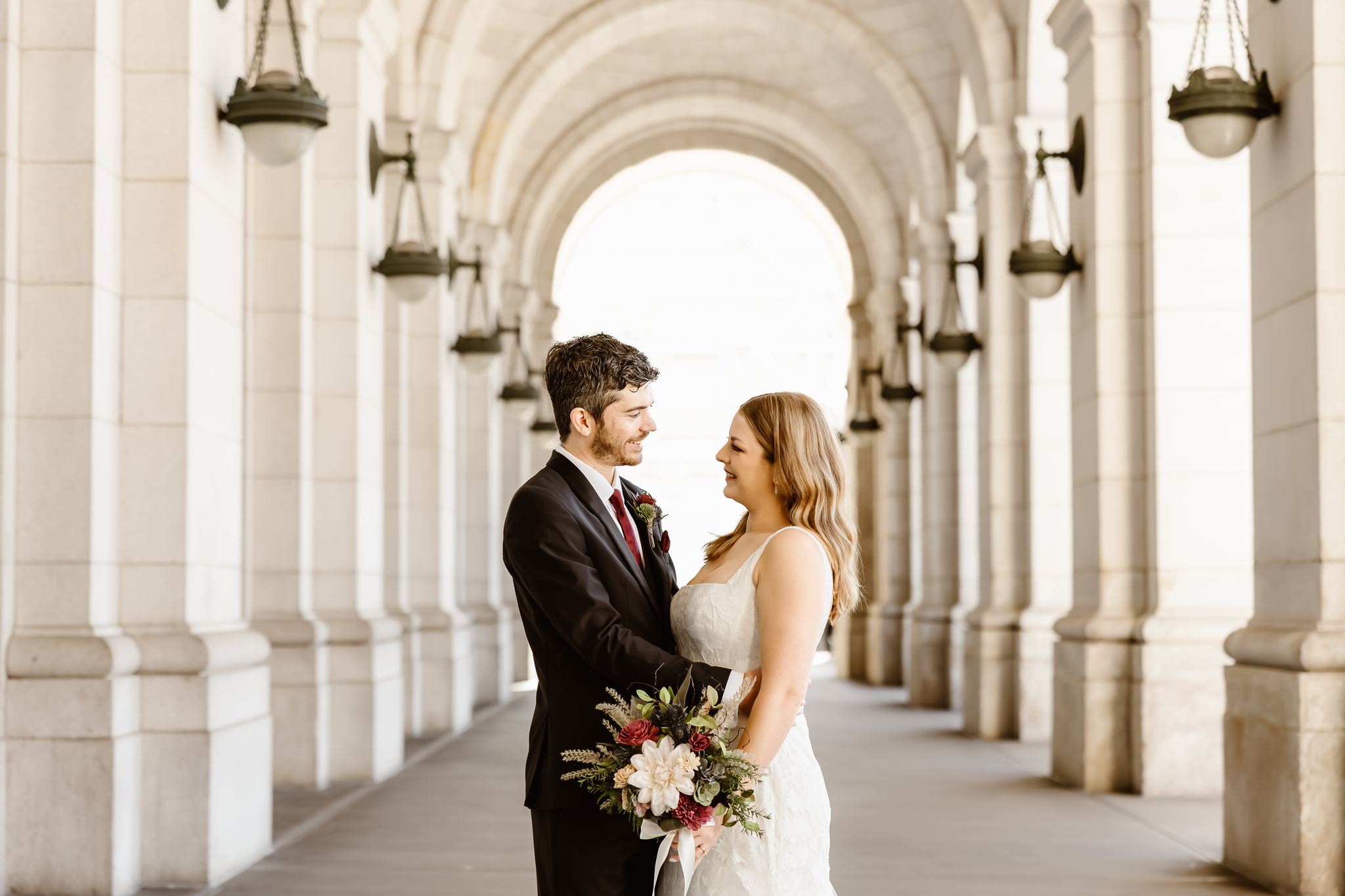 playful elopement couple at the union station in washington dc