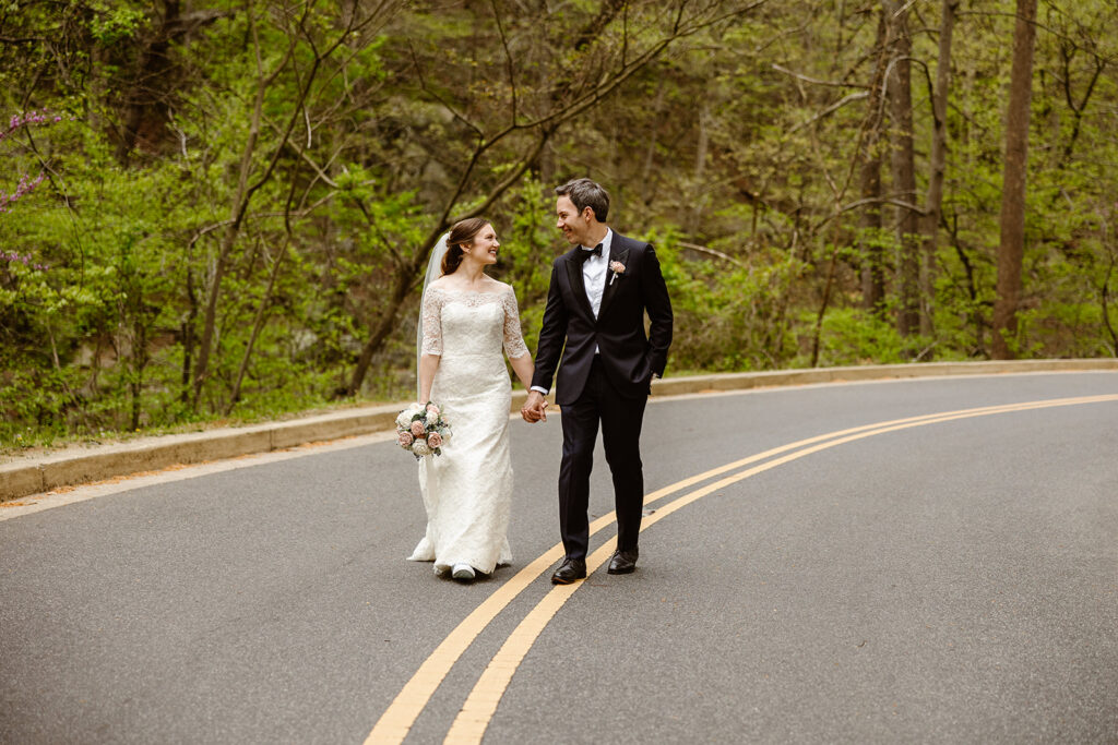bride and groom walking in rock creek park
