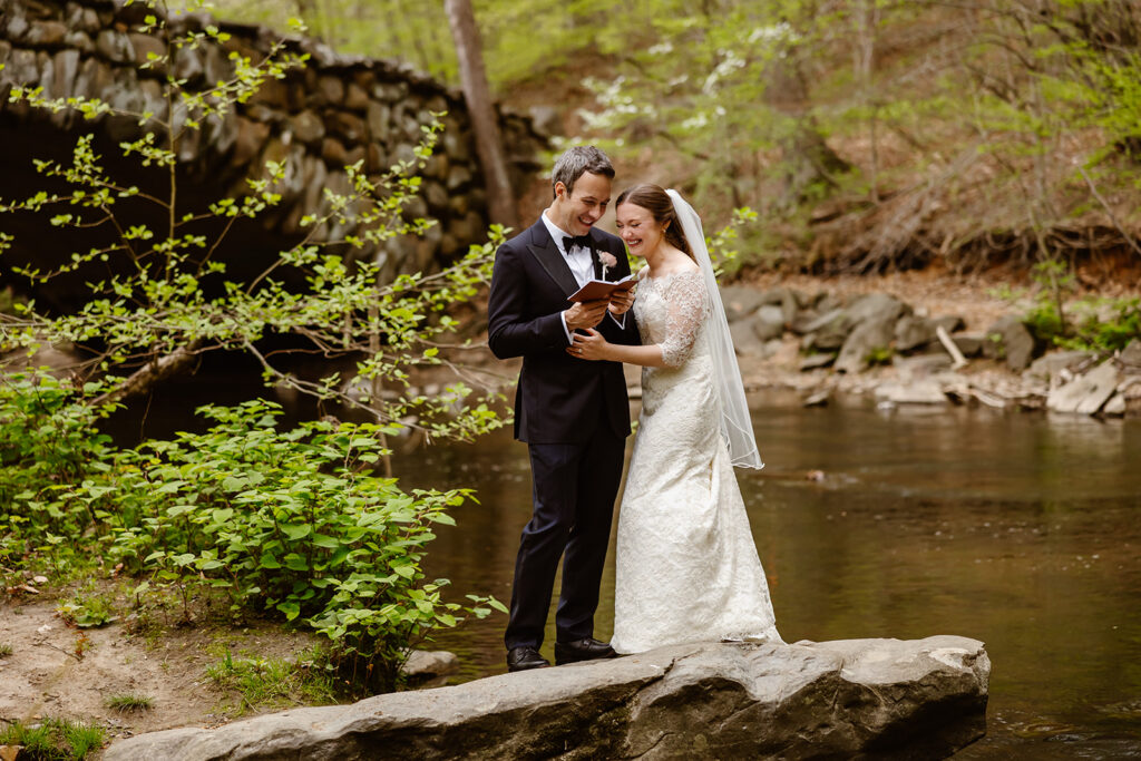 elopement couple exchanging private vows by the water at rock creek park